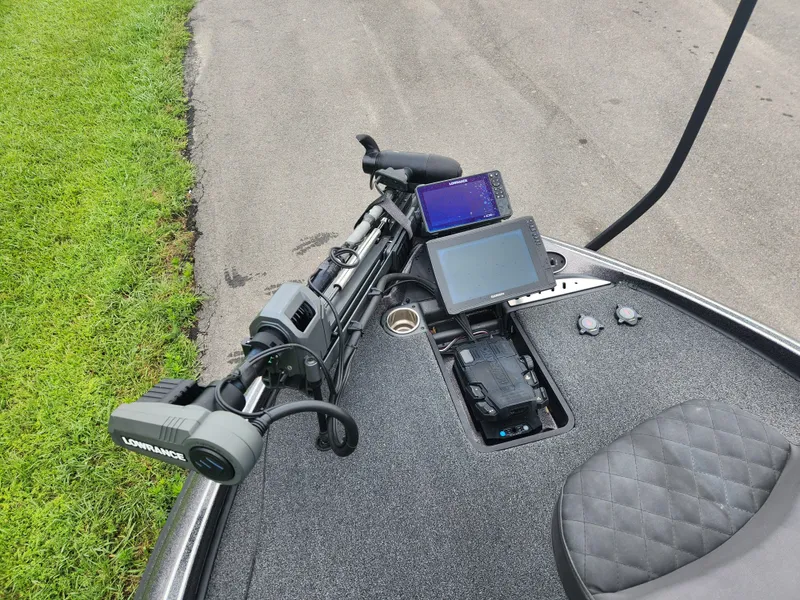 Slide: The Image of 2021 Triton 20 TRX boat with advanced navigation and fishing equipment on deck. - 8