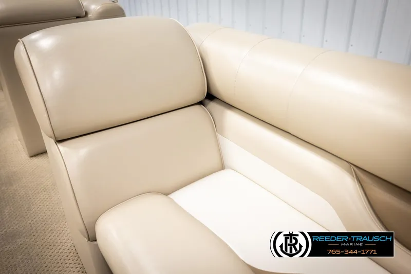 Slide: The Image of Beige seating on 2006 Sylvan 8524 Mirage RE boat, featuring plush upholstery. - 22