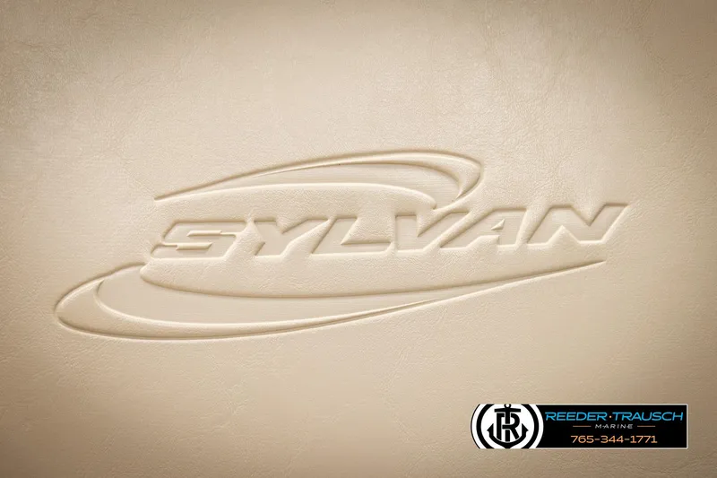 Slide: The Image of Embossed Sylvan logo on beige background, featuring Reeder-Trausch Marine contact details. - 24