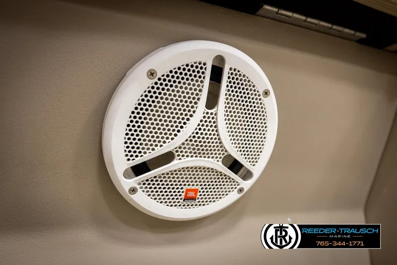 Slide: The Image of White speaker on a 2006 Sylvan 8524 Mirage RE boat interior. - 25