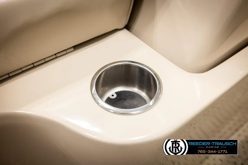 Slide: The Image of Cup holder in 2006 Sylvan 8524 Mirage RE boat interior. - 27