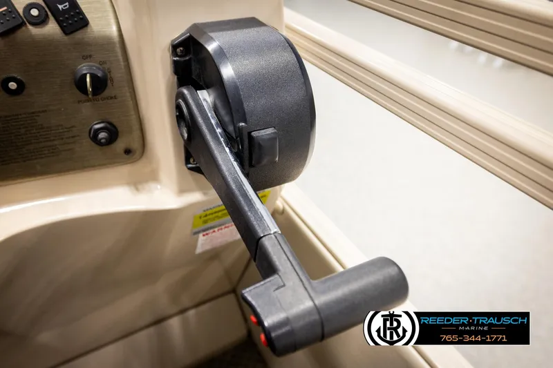 Slide: The Image of Control lever of 2006 Sylvan 8524 Mirage RE boat, featuring dashboard details. - 37
