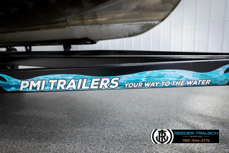 Slide: The Image of PMI Trailers branding on a 2006 Sylvan 8524 Mirage RE boat trailer. - 41