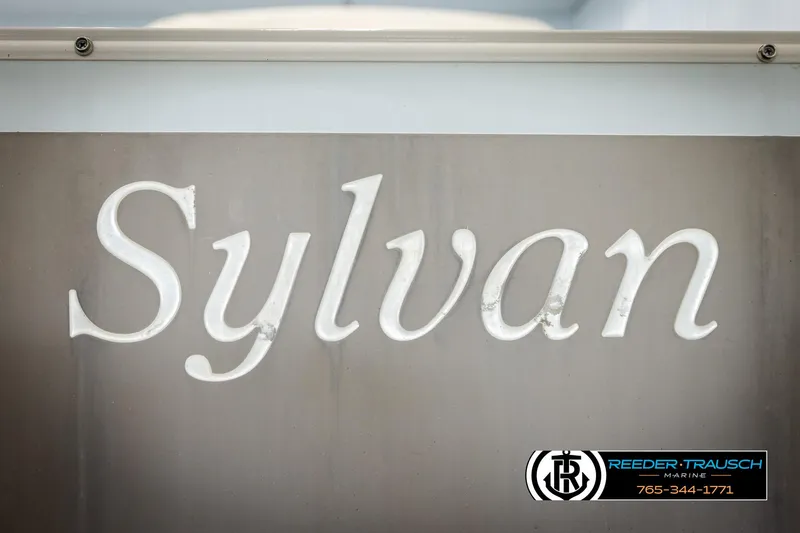 Slide: The Image of Sylvan 8524 Mirage RE 2006 logo on metallic surface with Reeder-Trausch Marine branding. - 42