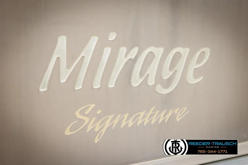 Slide: The Image of 2006 Sylvan 8524 Mirage RE boat logo with "Mirage Signature" text. - 44