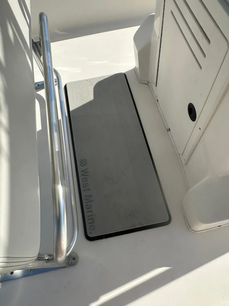 Slide: The Image of 2021 Cobia 21 Bay boat interior with West Marine mat. - 14