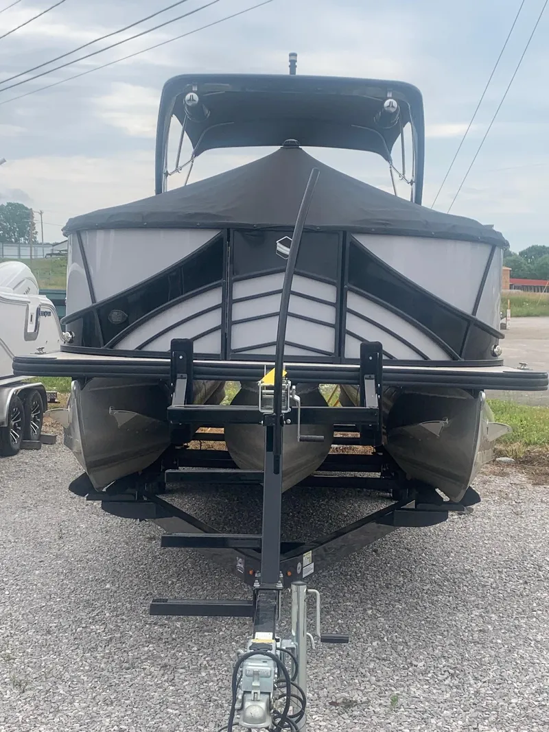 Slide: The Image of 2018 South Bay 725 RS ARCH DELUXE 3.0 pontoon boat on trailer, front view. - 17