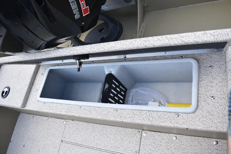 Slide: The Image of 2025 Lund 1875 Alaskan SS boat storage compartment with fishing gear. - 13