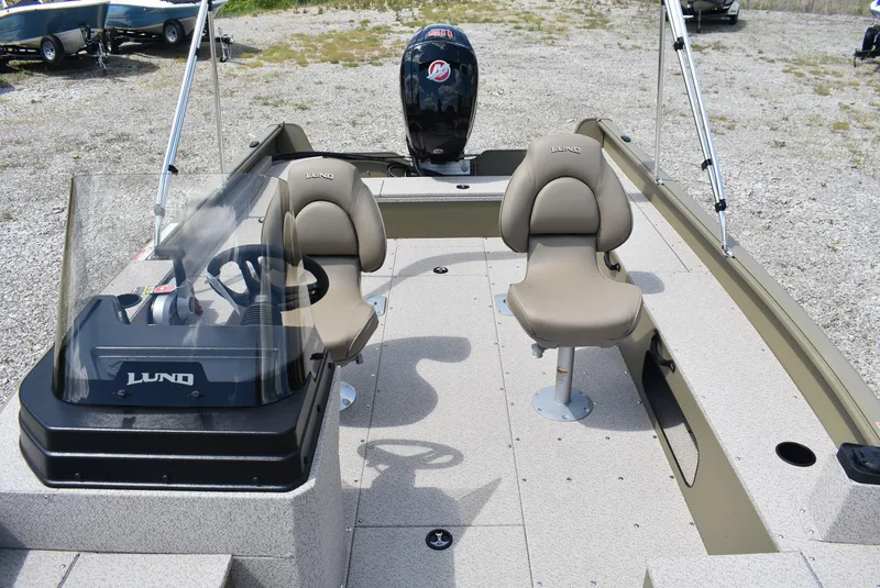 Slide: The Image of 2025 Lund 1875 Alaskan SS boat interior with dual seats and steering console. - 15