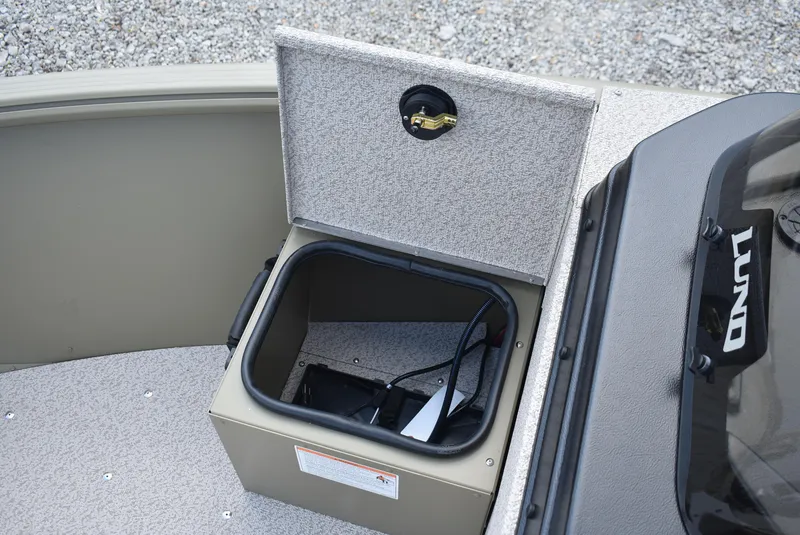 Slide: The Image of 2025 Lund 1875 Alaskan SS boat storage compartment with open lid. - 18