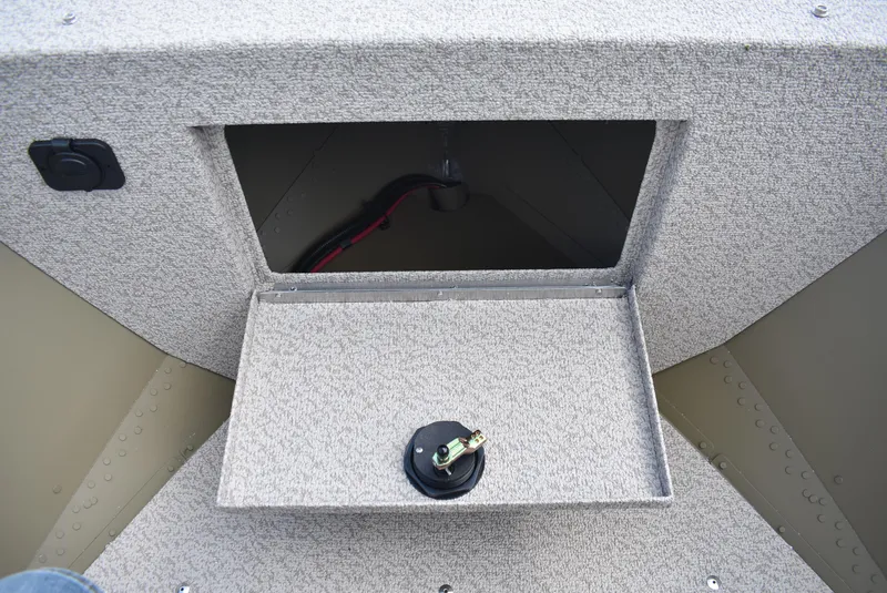 Slide: The Image of 2025 Lund 1875 Alaskan SS boat storage compartment with open hatch and latch. - 20
