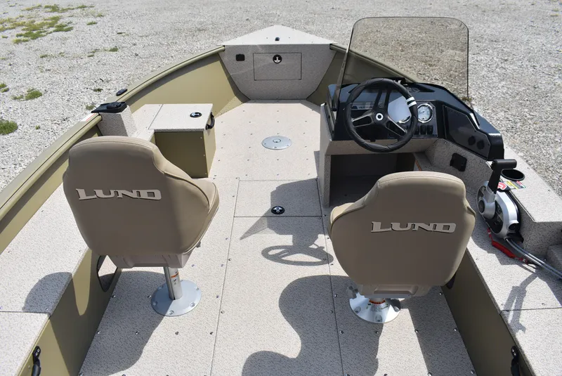 Slide: The Image of 2025 Lund 1875 Alaskan SS boat interior with dual seats and steering console. - 8