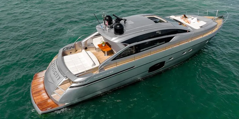 Slide: The Image of Luxurious 2015 Pershing 62' yacht cruising on open water, showcasing sleek design and elegance. - 2