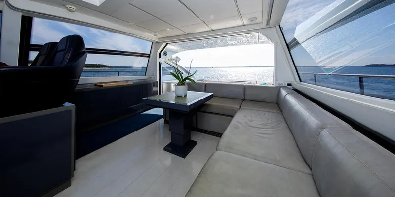 Slide: The Image of Luxurious interior of 2015 Pershing 62' yacht with panoramic ocean view. - 5