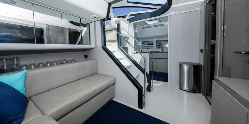 Slide: The Image of Luxurious interior of a 2015 Pershing 62' yacht with modern design and elegant furnishings. - 7