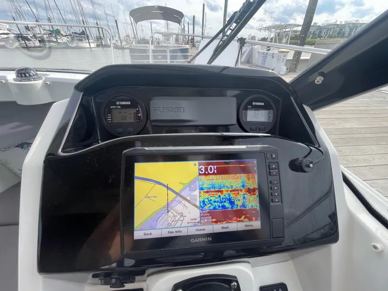 Slide: The Image of Dashboard of 2019 Jeanneau NC 695 boat with Garmin navigation system. - 10