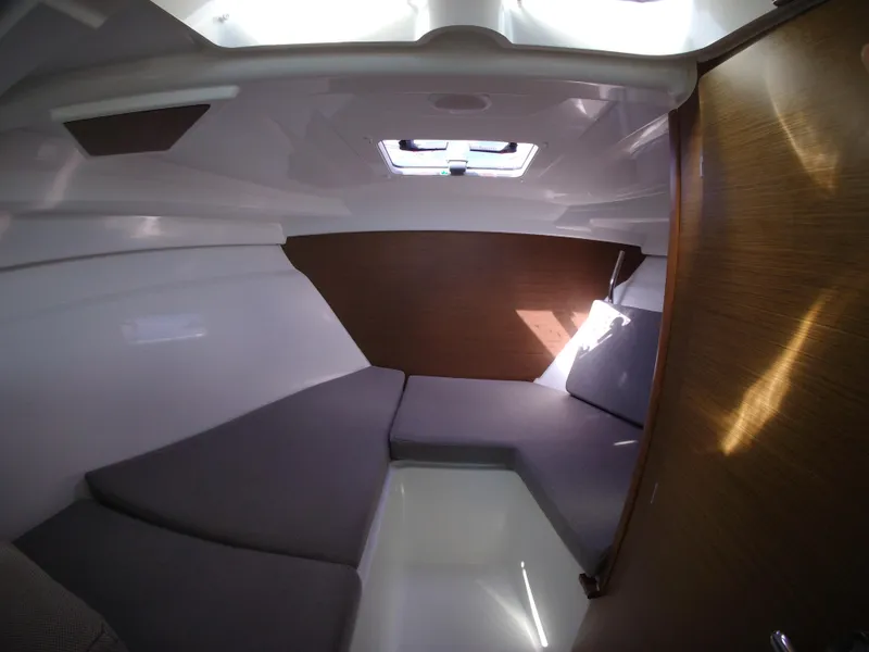 Slide: The Image of 2019 Jeanneau NC 695 cabin interior with modern design and comfortable seating. - 23