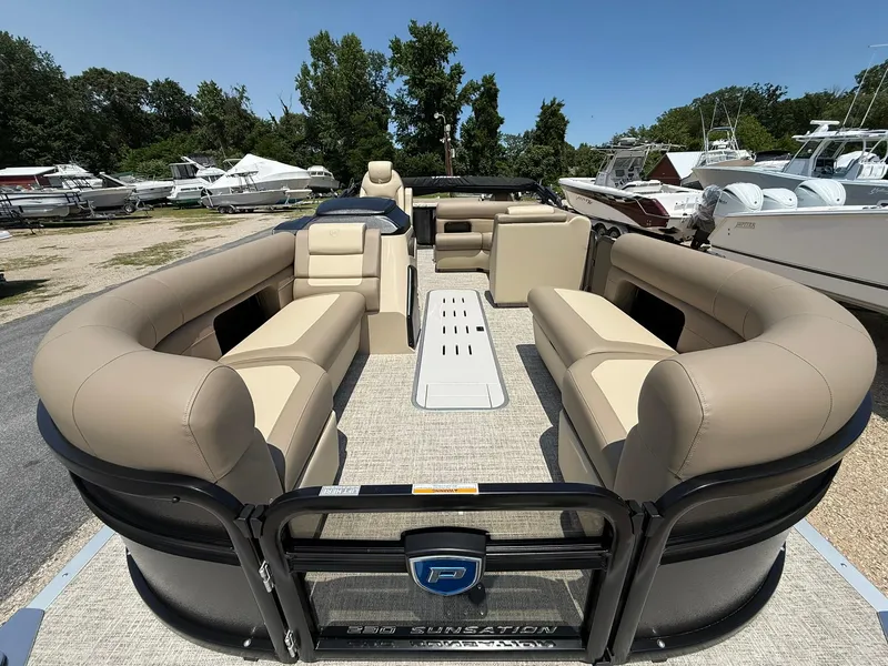 Slide: The Image of 2025 Premier 230 Sunsation Angler 2pt pontoon boat with spacious seating and modern design. - 10