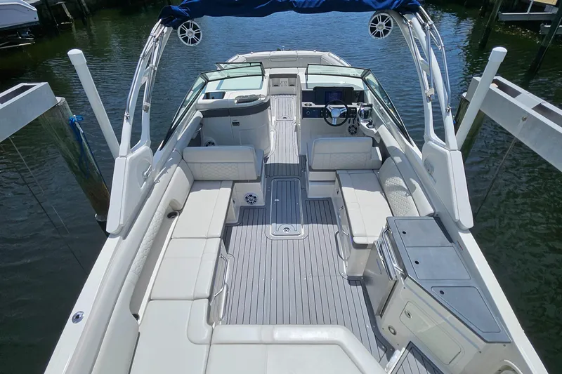Slide: The Image of 2021 Sea Ray SDX 290 Outboard boat interior with spacious seating and modern amenities. - 44