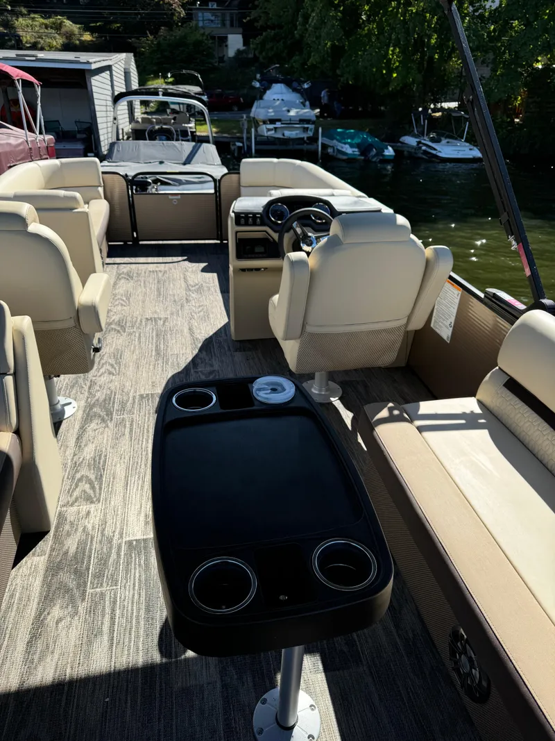 Slide: The Image of 2023 Godfrey SWEETWATER 2186 SB pontoon boat with beige seating and sleek interior design. - 11