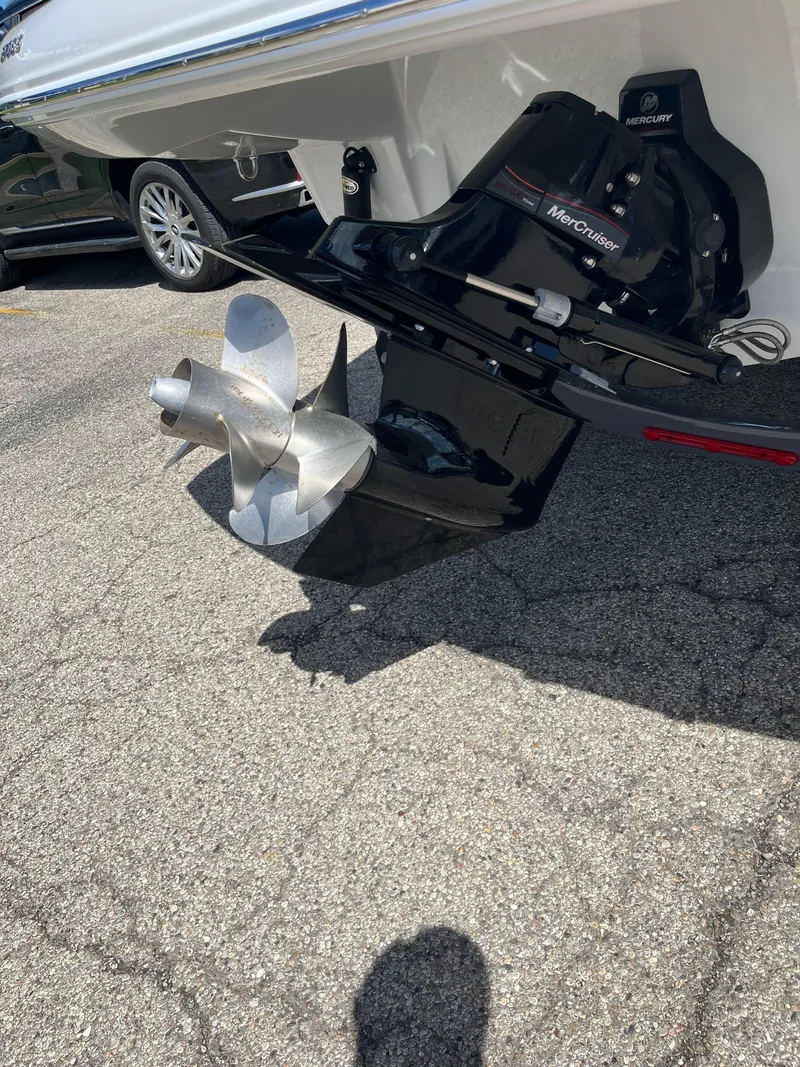 Slide: The Image of 2024 Crownline 270 SS boat with MerCruiser outdrive and stainless steel propeller. - 15