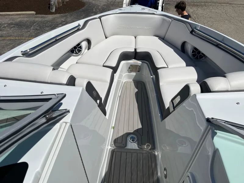 Slide: The Image of 2024 Crownline 270 SS boat interior with white seating and sleek design. - 5