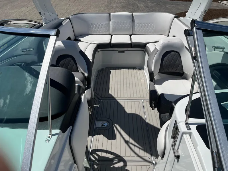 Slide: The Image of 2024 Crownline 270 SS boat interior with luxurious seating and modern design. - 7
