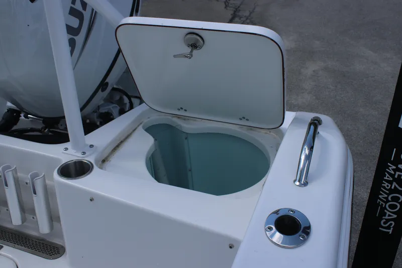 Slide: The Image of Open storage compartment on a 2025 Sea Pro 202 CC boat. - 11