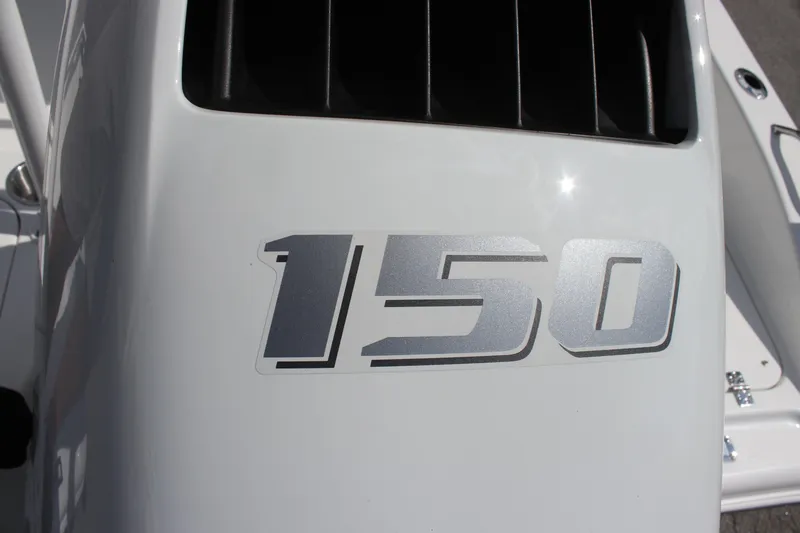 Slide: The Image of Close-up of 2025 Sea Pro 202 CC boat engine with '150' decal. - 6