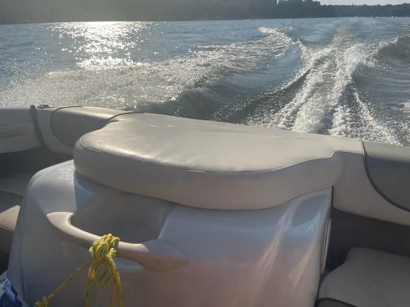 Slide: The Image of 2004 Sea Ray 185 Bow Rider cruising on a sunny day, leaving a wake behind. - 24