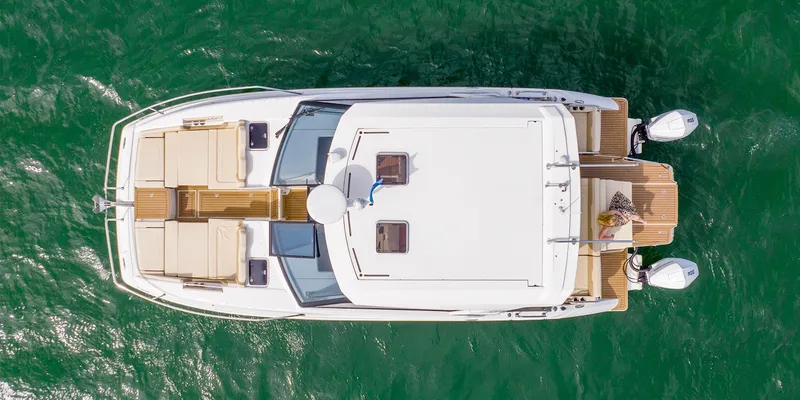 Slide: The Image of Aerial view of 2021 Aquila 36 Sport boat on water. - 13