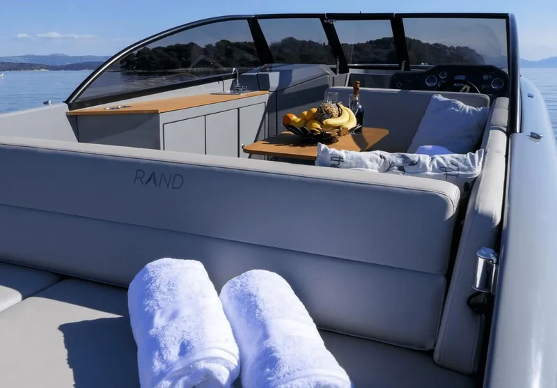 Slide: The Image of Luxurious Rand Supreme 27 yacht interior with towels and refreshments, 2025 model. - 28
