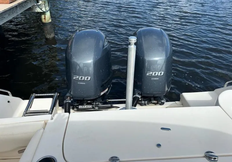 Slide: The Image of Twin Yamaha 200 engines on a 2016 Grady-White Freedom 275 boat. - 6