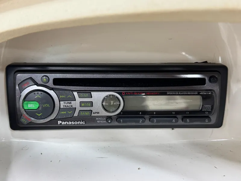 Slide: The Image of Panasonic car stereo installed in a 1997 Sea Ray 185 BR boat dashboard. - 21