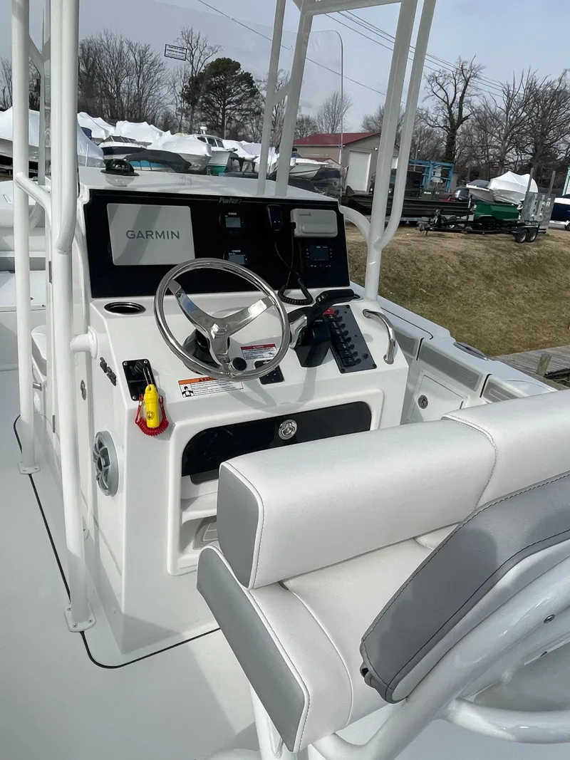 Slide: The Image of 2025 Parker 2100 Special Edition boat console with Garmin navigation system. - 5