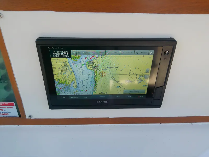 Slide: The Image of Garmin GPS display on 1985 Robalo 2520 Center Console boat dashboard. - 29
