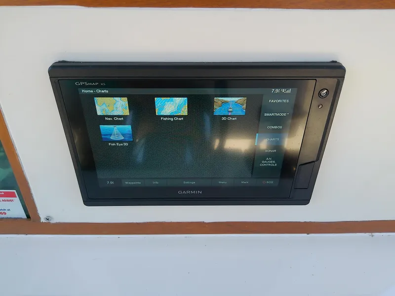 Slide: The Image of Garmin navigation display on 1985 Robalo 2520 Center Console boat dashboard. - 30
