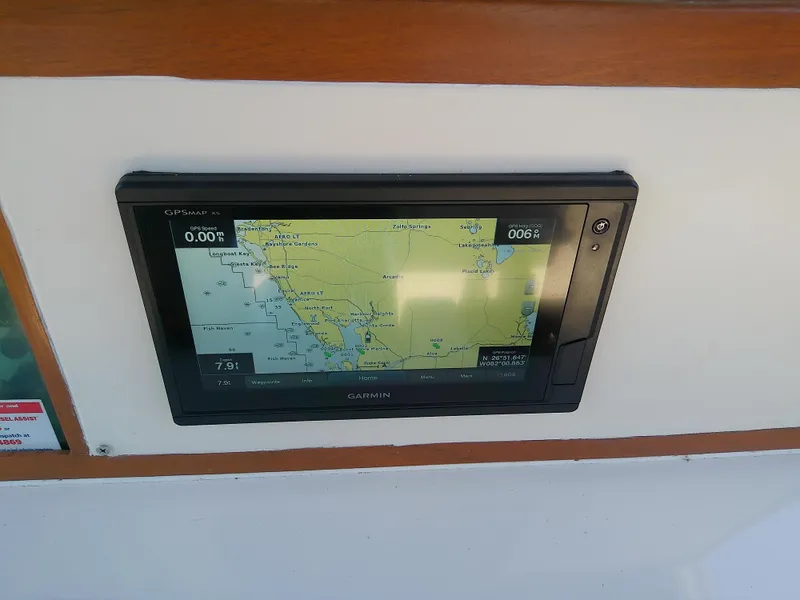 Slide: The Image of Garmin GPS display on 1985 Robalo 2520 Center Console boat dashboard. - 31
