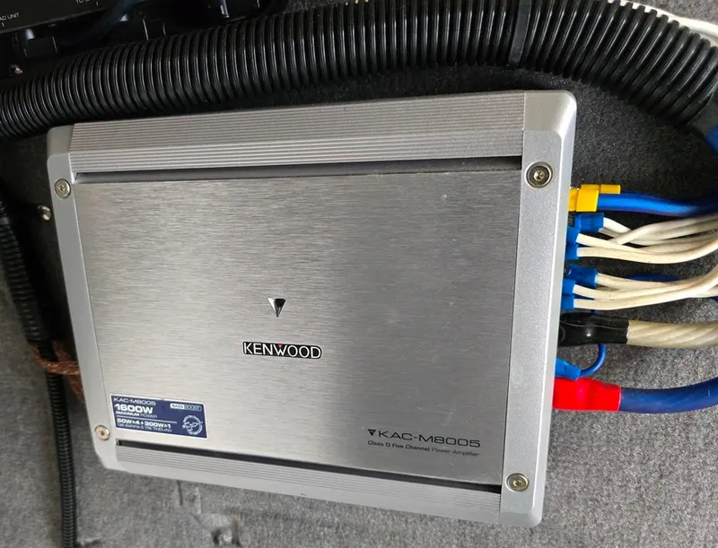 Slide: The Image of Kenwood amplifier KAC-M8005 installed in a 2008 Bryant 246 BR boat. - 18