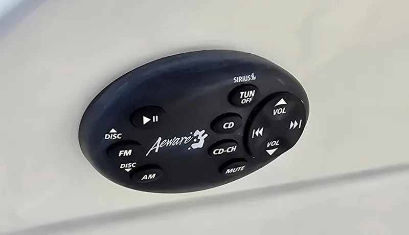 Slide: The Image of Audio control panel on a 2008 Bryant 246 BR boat, featuring various media options. - 19