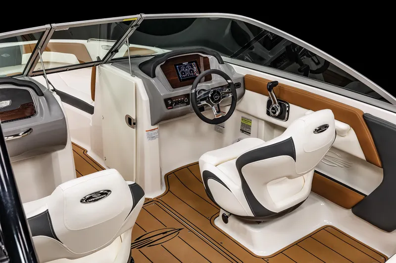 Slide: The Image of 2025 Chaparral 21 SSi boat interior with modern dashboard and seating. - 15