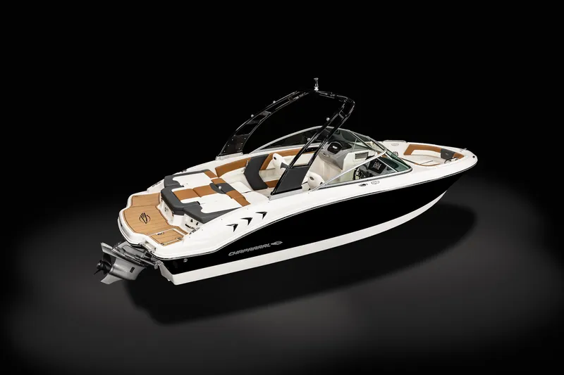 Slide: The Image of 2025 Chaparral 21 SSi boat with sleek black and white design, luxurious seating, and modern features. - 4