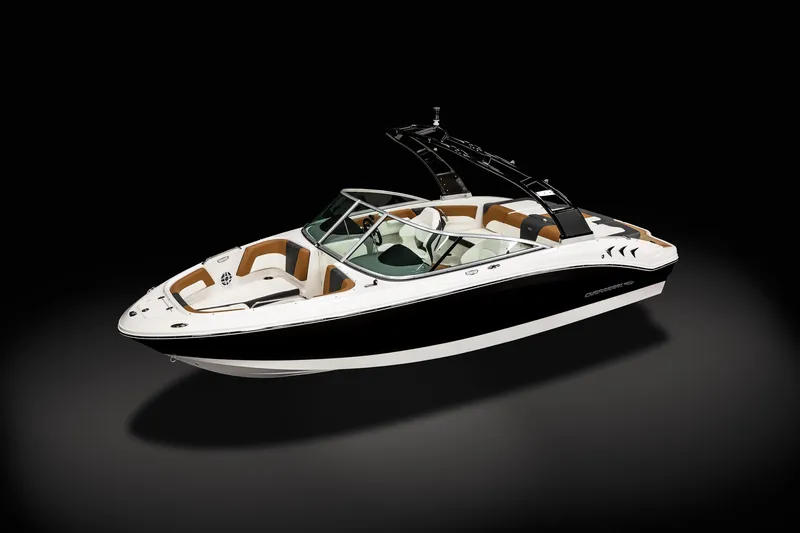Slide: The Image of 2025 Chaparral 21 SSi boat with sleek black and white design, luxurious seating. - 7