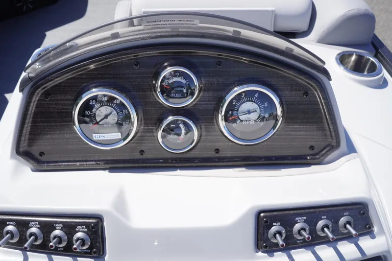 Slide: The Image of Dashboard of 2025 Lowe SS 230 boat with gauges and controls. - 23