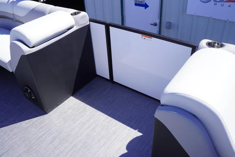 Slide: The Image of 2025 Lowe SS 230 boat interior with cushioned seating and modern design. - 34