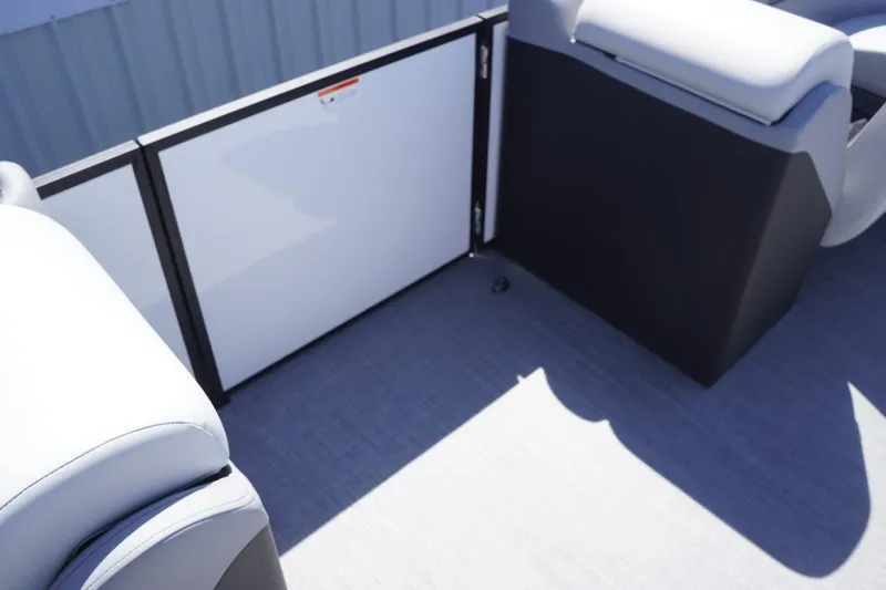 Slide: The Image of 2025 Lowe SS 230 boat interior with seating and storage compartments. - 35