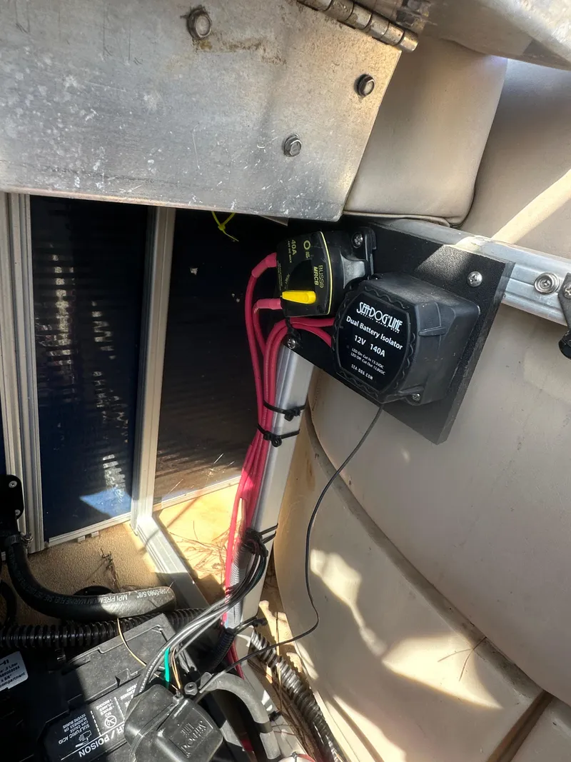 Slide: The Image of Electrical wiring and components inside a 2015 Godfrey Sweetwater 220 Premium Edition Coastal Edition boat. - 23