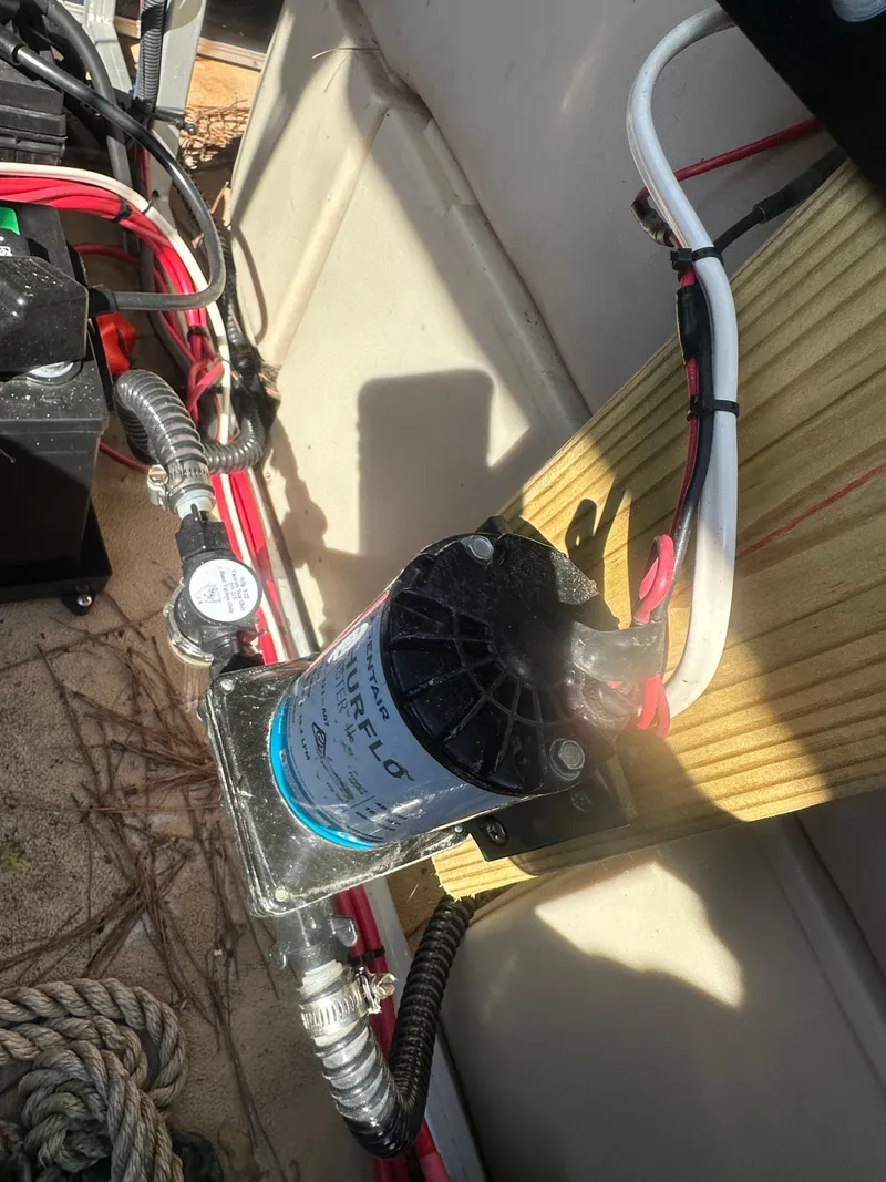 Slide: The Image of 2015 Godfrey Sweetwater 220 boat wiring and pump system installation. - 24