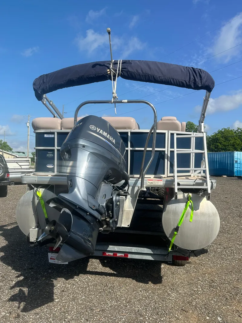 Slide: The Image of 2015 Godfrey Sweetwater 220 Premium Edition pontoon boat with Yamaha outboard motor. - 6