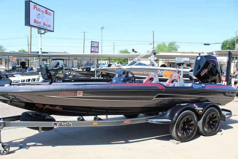 Slide: The Image of 2021 Bass Cat Cougar FTD boat on trailer at dealership. - 10